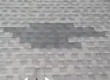 Shingle repair showing new shingles not matching old shingles