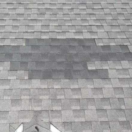 Shingle repair showing new shingles not matching old shingles