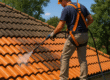 “Native Sons Roofing team safely cleaning tile roof in Florida”